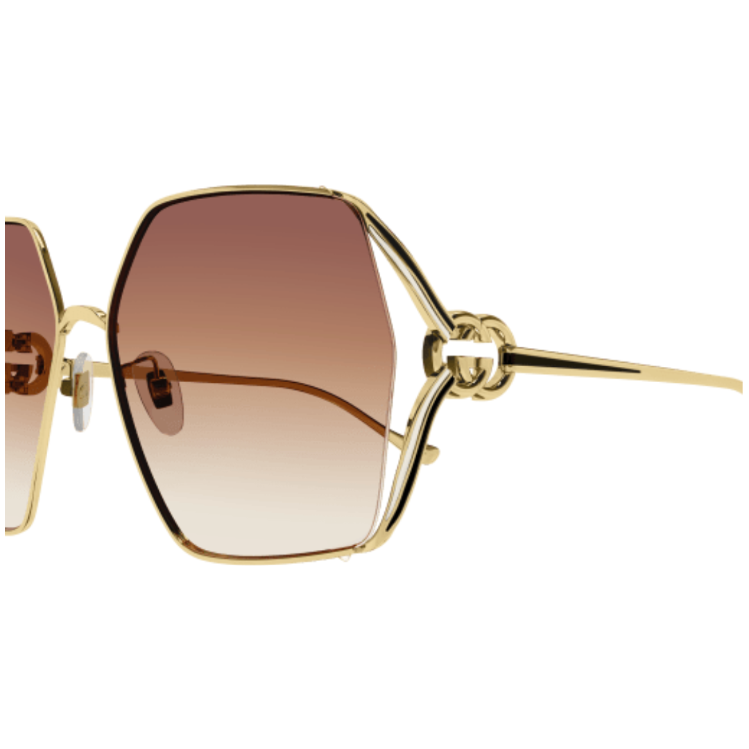 GUCCI WOMENS SUNGLASSES GOLD/AMBER GG1322SA